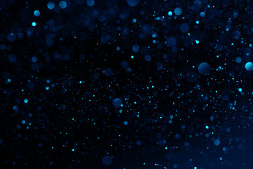 Glitter sparkles blue abstract background
