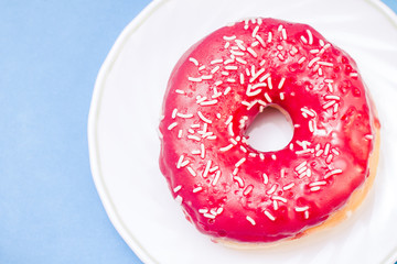 Donut. Sweet icing sugar food.