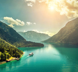 Beautiful morning sunrise view on the mountain lake in Alps 