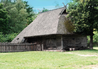 Fototapeta na wymiar Old fashioned timber house in XIX century village
