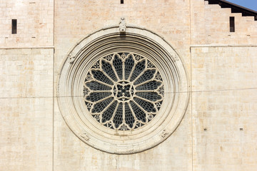 Rose window on Trento cathedral in northern Italy