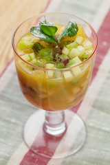 Delicious dessert in a glass cup close up top view