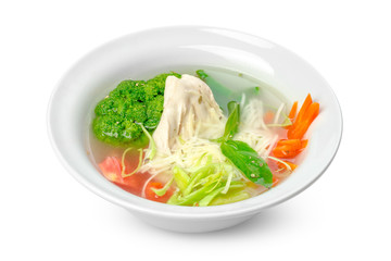 Chicken noodle soup isolated on a white background