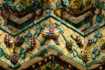Close up beauitful mosaic tiles of large stupas in Wat Pho or Wat Phra Chetuphon Vimolmangklararm Rajwaramahaviharn is one of Bangkok's oldest temples