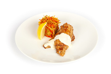 Fried fish with salad and lemon