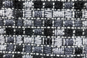 Checked embroidered thick grey fabric from above