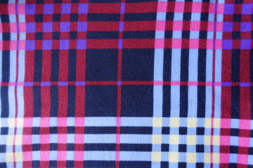 Colorful fabric with checks print from above