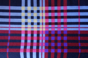 Surface of colorful checkered fabric from above