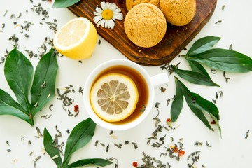 Cup of tea and mint on a dark background
