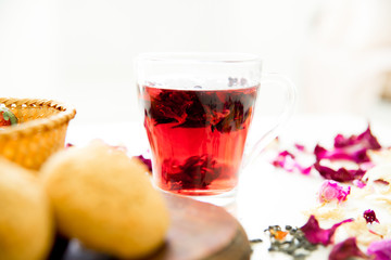 Cup of tea and mint on a dark background