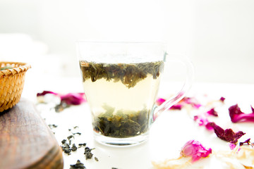 Cup of tea and mint on a dark background