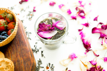 Cup of tea and mint on a dark background