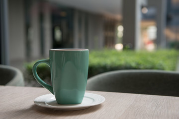 ceramic coffee cup on table