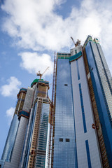 Two Skyscrapers Under Construction on a Clear Day