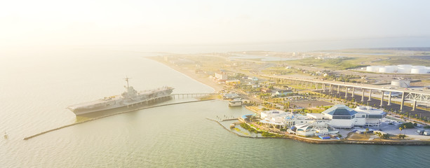 Panorama aerial view North Beach in Corpus Christi, Texas, USA with aircraft carrier ship