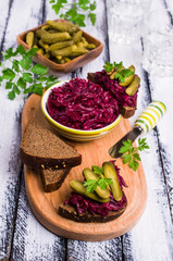 Sandwiches with beet and pickled cucumber