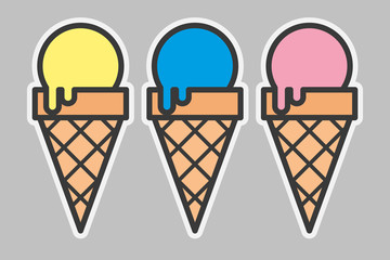 Helados con bolas amarilla, azul y rosa. 