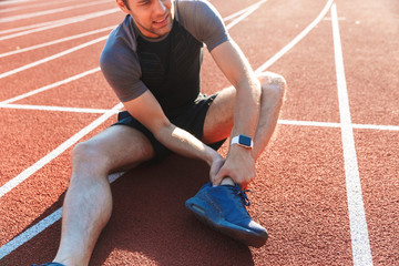 Cropped image of a tired sportsman