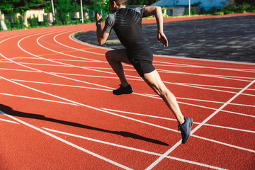 Cropped image of concentrated young sportsman