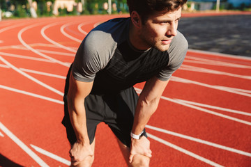 Exhausted sportsman finished running