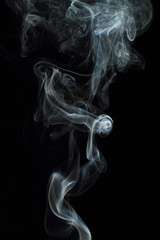White smoke texture on black background © Yuriy