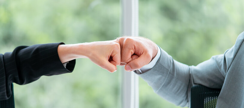 Business Man And Woman Business Couple Fist Bump Hand Together For Team Work