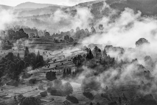 Fototapeta Misty carpathian village hills after the rain