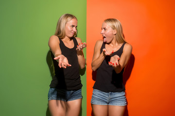 Reject, rejection, doubt concept. Doubtful women with thoughtful expression making choice. Young emotional women. Human emotions, facial expression concept. Front . Studio.