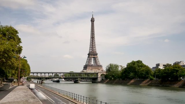 Time lapse in Paris. View on the Eiffel tower and the banks of the Seine, the Paris river. Summer.
