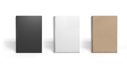 Several recycled paper notebooks isolated on white. 3D