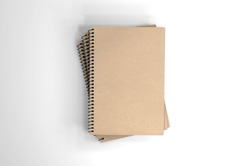 Heap recycled paper notebook isolated on white