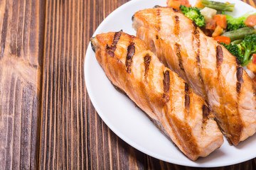 Grilled salmon fish with vegetables