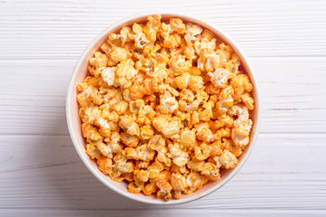 Yellow cheese popcorn in bowl