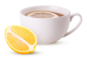 Hot black tea with lemon cut in half and slice