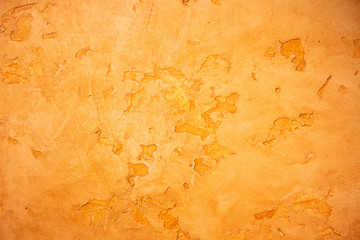 texture of the orange plastered wall