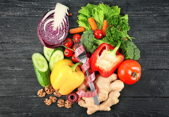 Flat lay composition with diet food on wooden background