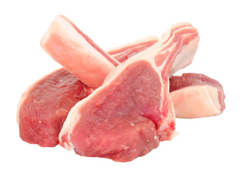 Group of fresh raw lamb cutlets isolated on a white background