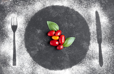 Tomatoes and basil leaves