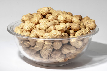 Peanuts isolated on white background. Peanut macro.