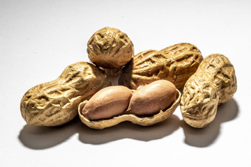 Peanuts isolated on white background. Peanut macro.