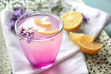 Tray with lavender lemonade in glass, closeup
