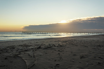 Sandy beaches of Rimini shortly after dawn in winter