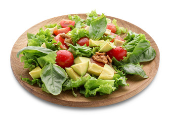 Plate with tasty avocado salad on white background