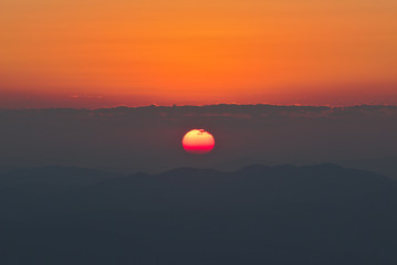 A Beautiful Sunrise on Mountain with red sky background