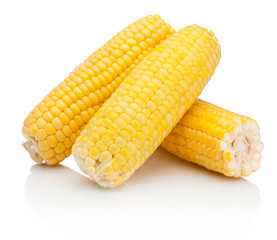 Three corn on cobs kernels peeled isolated on white background