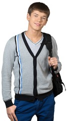 Teen male preppy carrying a duffel bag