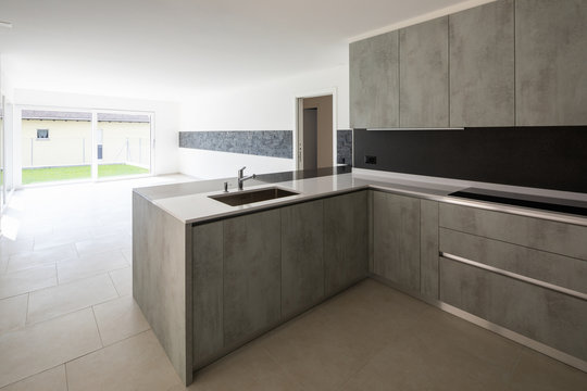 Modern kitchen in bright white apartment