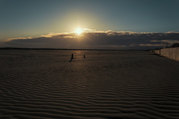 Sandy beaches of Rimini shortly after dawn in winter