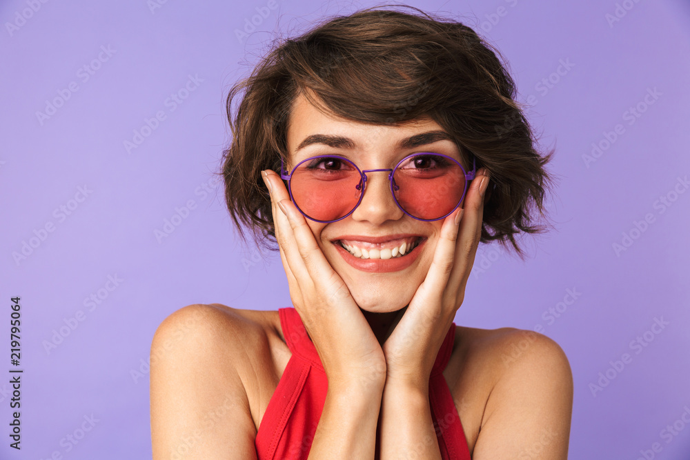 Sticker Happy Pretty brunette woman in sunglasses touching her cheeks