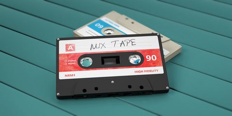 Vintage audio cassettes, text mix tape on the label, isolated on wooden background. 3d illustration